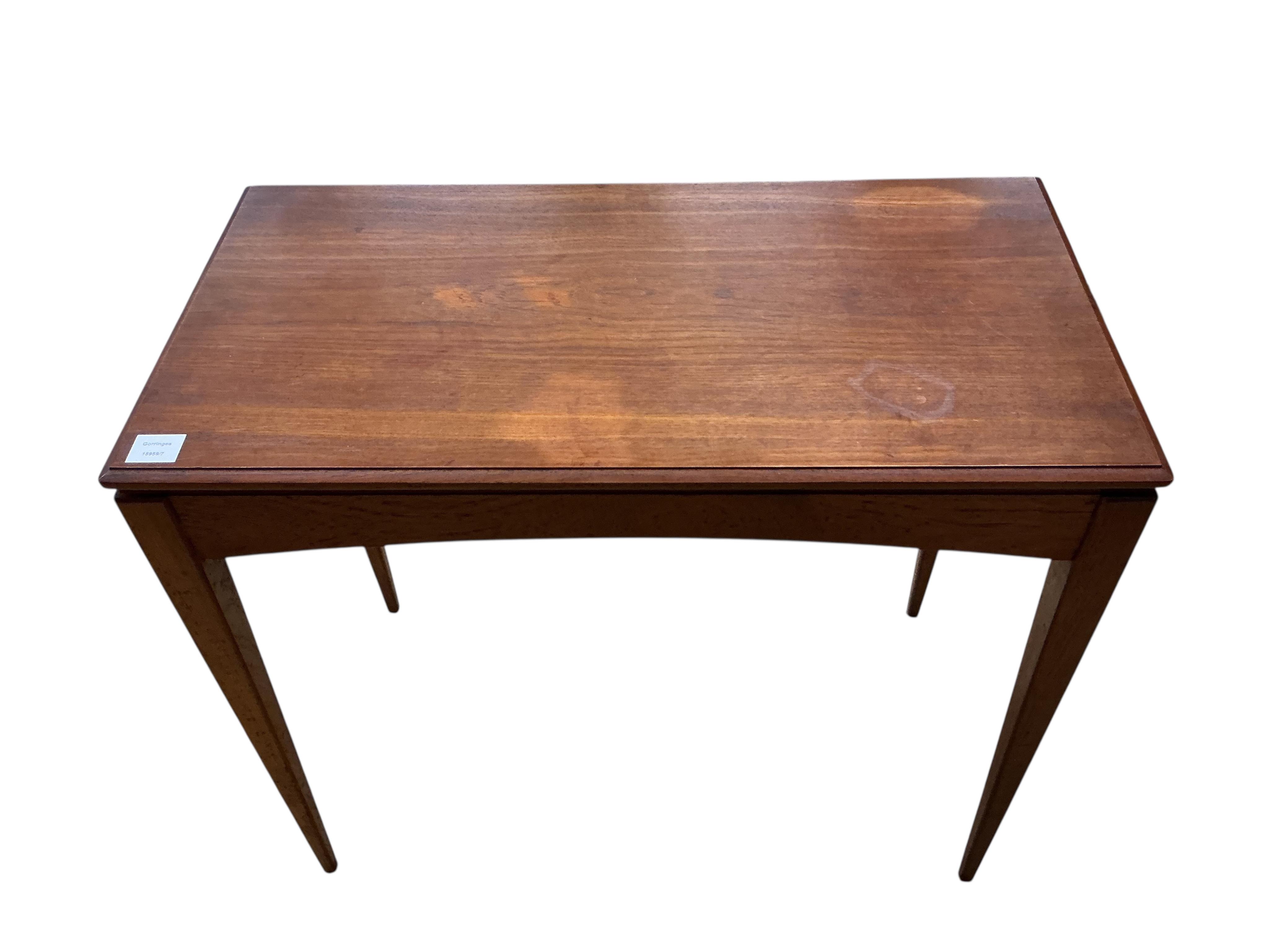 In the manner of Gordon Russell, a mid century rectangular teak side table, width 85cm, depth 44cm, height 76cm